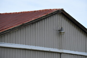 Old warehouse with halogen lamp at peak.