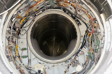 Space of a decommissioned fighter jet where a jet engine was mounted