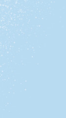 Snowy christmas background. Subtle flying snow flakes and stars on light blue winter backdrop. Delicate sweet snowy christmas. Vertical vector illustration.