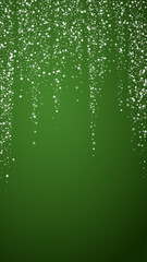 Magic falling snow christmas background. Subtle flying snow flakes and stars on christmas green background. Magic falling snow holiday scenery.   Vertical vector illustration.