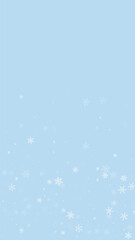 Beautiful snowfall christmas background. Subtle flying snow flakes and stars on light blue winter backdrop. Beautiful snowfall overlay template. Vertical vector illustration.