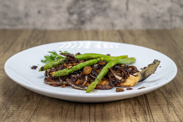 Trout cooked to perfection served with asparagus spears