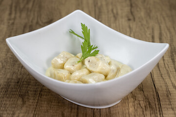 Italian appetizer potato gnocchi served and cooked to perfection before you meal