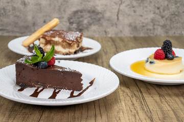 Italian dessert menu offering chocolate bitter sweet cake, tirimasu, or panna cotta