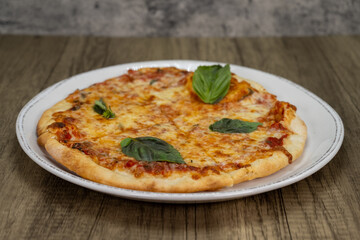 Margherita pizza cooked to perfection with extra crispy crust