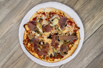 Overhead view of Veggie pizza cooked to perfection with extra crispy crust