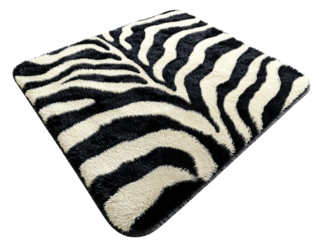 Animal print floor rug with a zebra stripe pattern featuring black and white colors