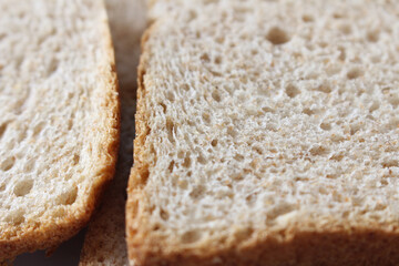 close up of bread. bread with selective focus. texture of whole wheat bread. bread slices.
