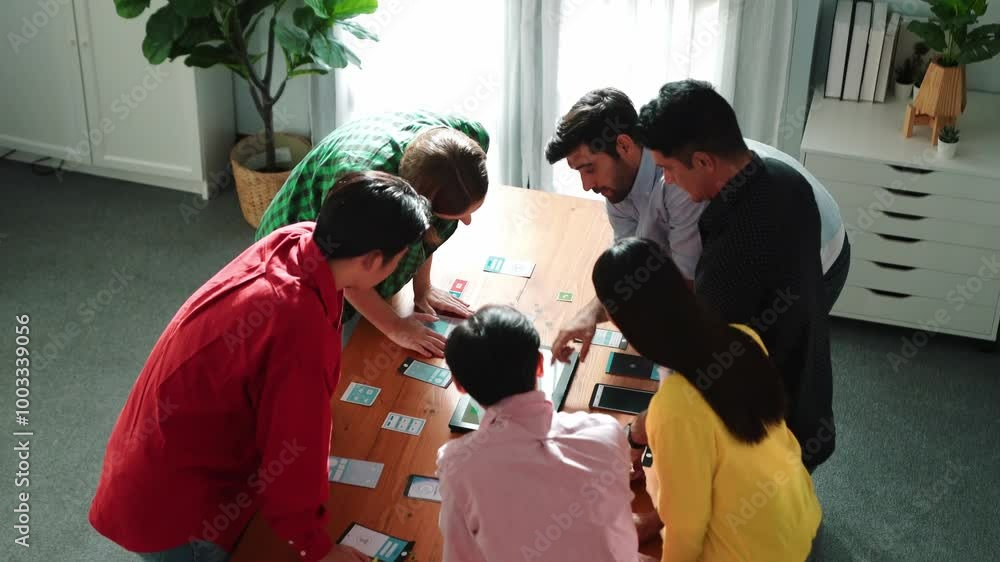 Poster Top view of diverse business people discussing idea and designing system while using tablet with Ux, Ui design display on screen. Multicultural working together and planning strategy. Convocation.