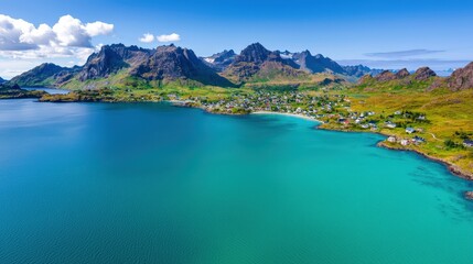 Fototapeta premium Picturesque Coastal Village with Mountain Range and Turquoise Water