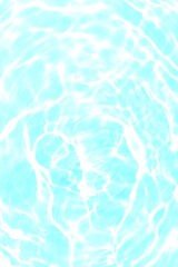Blue water with ripples on the surface. Defocus blurred transparent blue colored clear calm water surface texture with splashes and bubbles. Water waves with shining pattern texture background.
