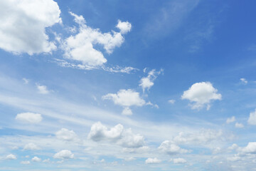Obraz premium Beautiful clouds during spring time in a Sunny day. Blue sky and white fluffy clouds