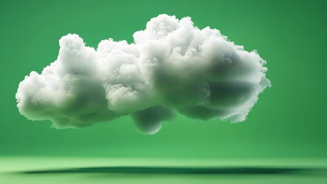 Fluffy white cloud casting a shadow is floating on a seamless looping green screen background, perfect for visual effects and compositing