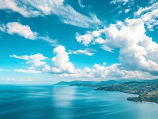 Obraz premium Blue sky with white clouds distant sea view