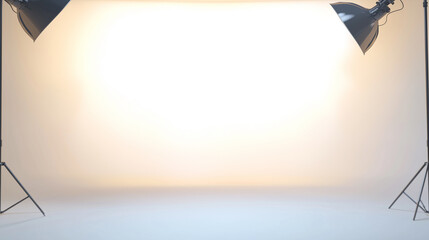 A professional studio setup featuring two lights positioned on either side of a white backdrop. T