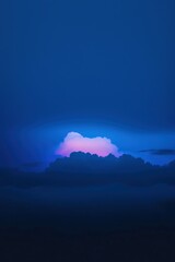 Pink cloud in a blue sky