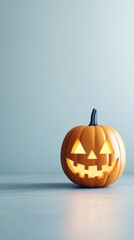 Halloween background, copy space. A charming carved pumpkin glowing softly against a minimalistic  backdrop, perfect for autumn festivities and Halloween celebrations