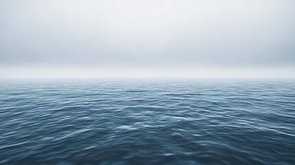 Obraz premium Calm ocean waves with fog