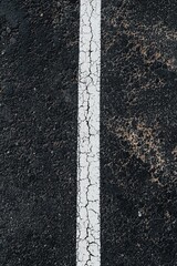 Fototapeta premium White line on black asphalt