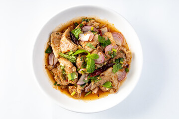 Grilled pork salad. on a white background Thai food. Isaan food.