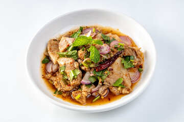 Grilled pork salad. on a white background Thai food. Isaan food.
