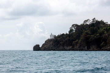 View to the shore near Portofino from the sea with dramatic sky