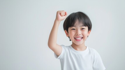 Asian boy with Victory Fist hand