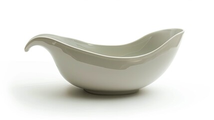 A white sauce ladle sits on a white background