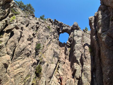 gigantic hole in the granite rock at Bocca di Velaco, Trou de la Bombe, at Conca, Sart&egrave;ne, 
