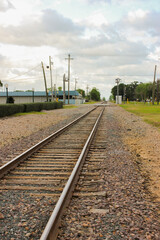 Fototapeta na wymiar City Train tracks Leading off to the horizon