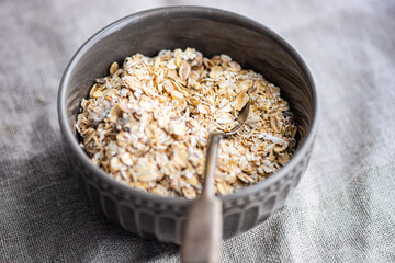 Raw organic oats in the bowl