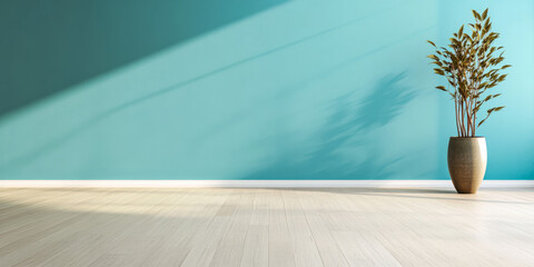 Modern interior featuring a vibrant turquoise wall and a potted plant in a sunlit room with wooden flooring