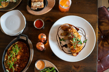 Overhead view of chicken dinner on table