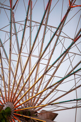 Ferris wheel detail spokes supports at dusk vertical