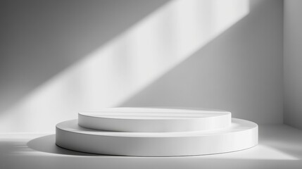 Fototapeta premium White round podium with soft background lighting and gentle shadows, ideal for clean and minimalist product presentations