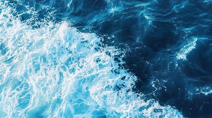 Fototapeta premium Vibrant ocean waves capture the beauty of nature, featuring rich blue tones and frothy white crests that inspire tranquility.