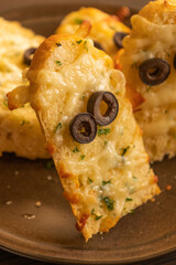 Halloween Garlic Bread Mummies - Delicious Close-Up