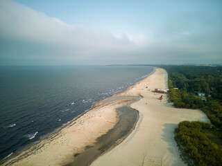 
Seaside town of Jelitkowo, buildings with beach and sea.