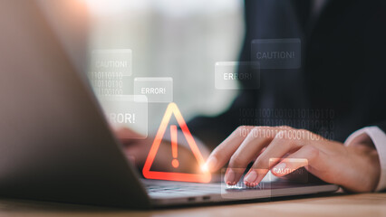 Programmer and virtual icons , exclamation mark ,alarm,computer virus detected ,danger warning concept or information error that should be urgently fixed and repaired ,Notification of security issues