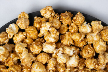 Sweet caramelized popcorn top view close up
