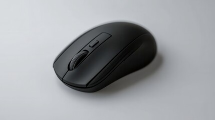 Black wireless computer mouse on a gray background.