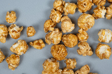 Sweet caramelized popcorn top view close up