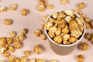 Sweet caramelized popcorn in a bucket.