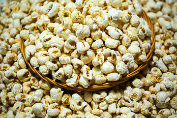 Close-up view of puffed corns in a basket, South Korea