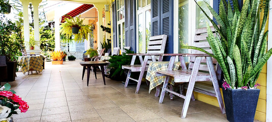 terrace decoration using ceramic floor tiles wood chairs set and plant pots create a point of interest, architecture concept