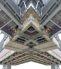 Obraz premium Design and installation of conduits, electrical and communication cable systems, backup systems, safety systems, drainage pipes below reinforced concrete structures, mirror effect