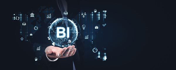 Business intelligence hologram with various icons on dark background.