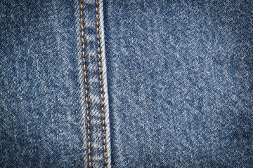 Naklejka premium seam of blue denim texture background, jean fashion style