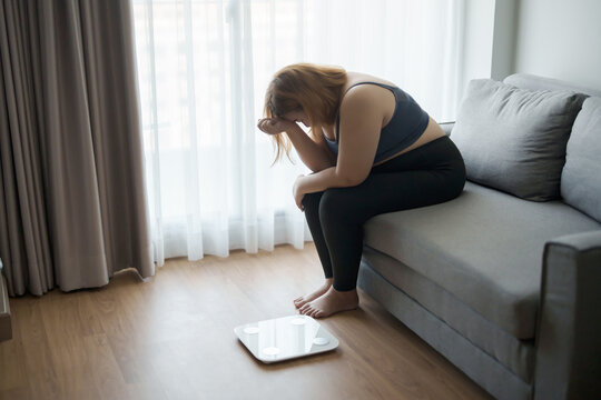 Depressed sadness overweight woman failure in weight loss