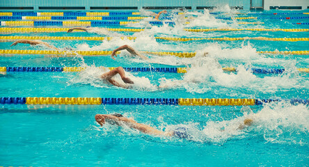 Turquoise swimming pool lanes, a symbol of sport
